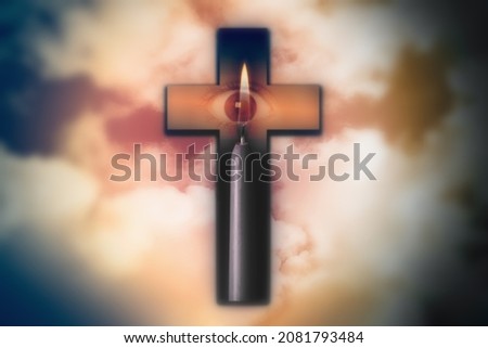 All-seeing eye, burning candle and Christian cross against the sky. Concept of spirituality and faith in jesus christ. 