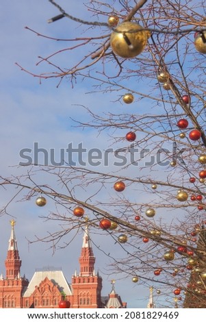 New Year's scenery on trees on Red Square, vertical photo