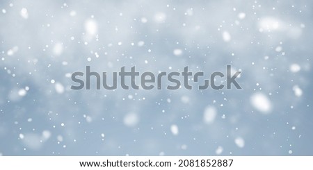 Christmas snow. Falling snowflakes on blue background. Snowfall. Vector illustration.
