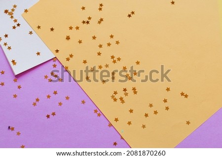 wooden stars on wooden colored background. Christmas decoration. Symbol of holiday. Stars.Top view flatlay . background for children's party. Design of Greeting Card With Christmas stars.