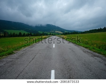 simple asphalt road in perspective with clear direction