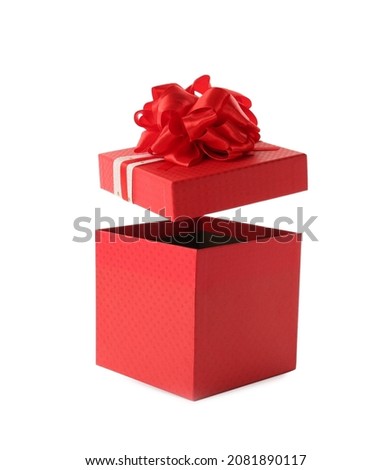 Red gift box and lid with bow on white background