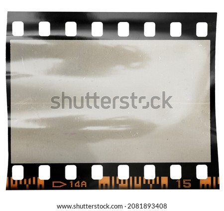 single 35mm dia filmstrip on white background with nice light reflection and dust. cool social media photo placeholder.