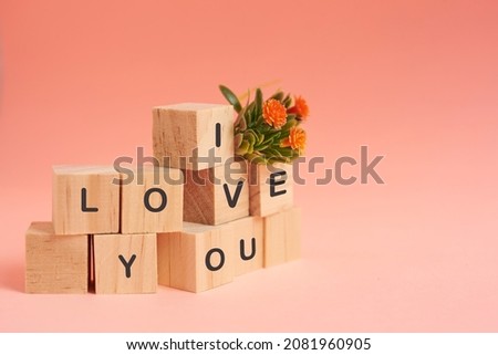 Poster. The word "I love you". Love for wood blocks. Love theme. Wooden letter blocks. positive and loving emotions. Wooden cubes with the word. An exclusive relationship.
