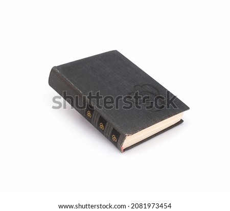 Book in black cover isolated on a white background