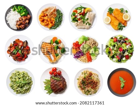 set of plates of food isolated on a white background, top view Royalty-Free Stock Photo #2082117361