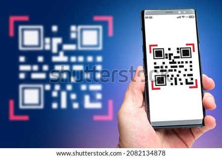 Mobile QR code. Smartphone in hand of man. Scan QR key. Concept of authorization using bar code. Metaphor of identification via QR link. Quick Response code. Dot matrix barcode in phone