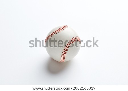 Baseball ball on white background with copy space. Overhead view.