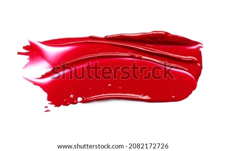 Red lipstick smudge isolated on white background