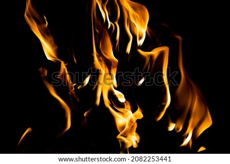 Fire burning in high contrast orange and black good editing picture