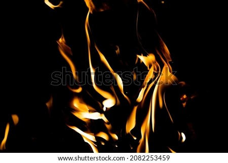 Fire burning in high contrast orange and black good editing picture