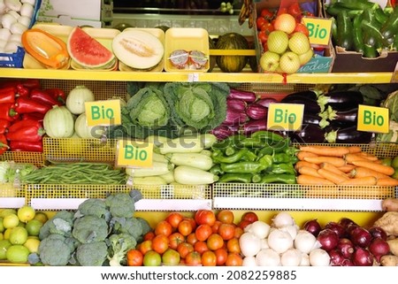 Offer of various organic vegetables and fruits with German-language "Bio" label. The labels shown in the photo are freely designed and are not subject to any copyright or trademark protection Royalty-Free Stock Photo #2082259885