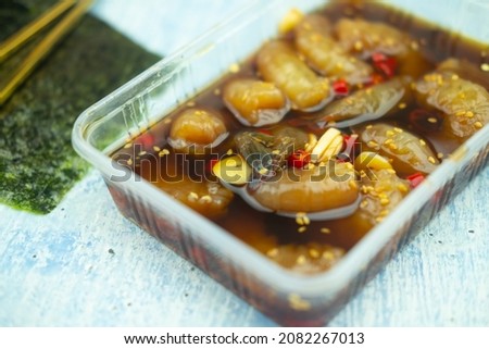 Korean style pickled prawns or Korean soy sauce pickled shrimp. Asian food style in box