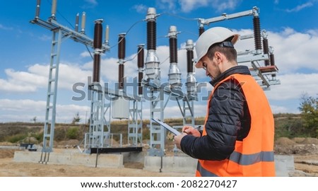 Engineer electrician check the substation construction process Royalty-Free Stock Photo #2082270427