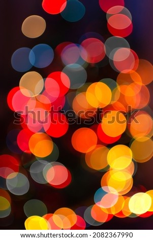 defocus lights bokeh blurred lights christmas tree lights red orange light bulbs