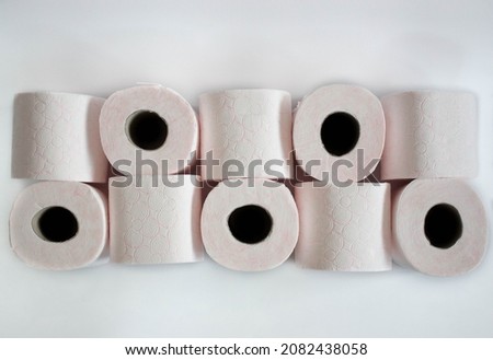 pink patterned tissue paper rolls , toilet paper rolls isolated on white background