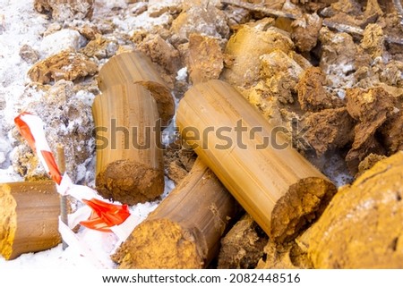 Geological samples of clay soil extracted from bowels for laboratory research. Determination of bearing capacity of soil for construction of structures, selective focus Royalty-Free Stock Photo #2082448516