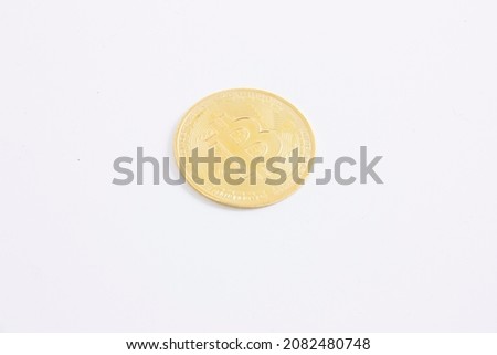 Bitcoin currency over clean white background for editing.