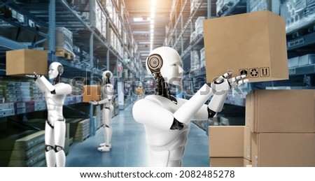Innovative industry robot working in warehouse for human labor replacement . Concept of artificial intelligence for industrial revolution and automation manufacturing process . Royalty-Free Stock Photo #2082485278