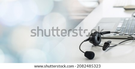 Headset and customer support equipment at call center ready for actively service . Corporate business help desk and telephone assistance concept . Royalty-Free Stock Photo #2082485323
