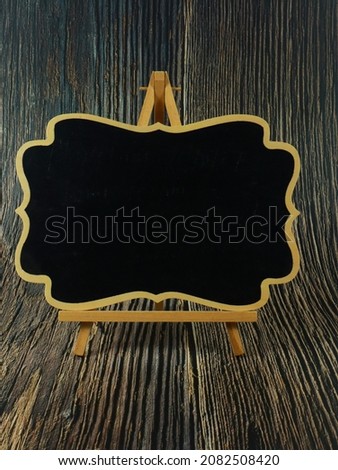 Wooden easel mini blackboard copy space available with clipping path with white background