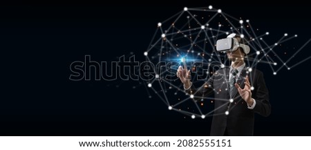 businessman wearing VR virtual reality headset hand touching virtual screen global link connecting diagram on dark background, networking security, digital, internet, communication, metaverse concept