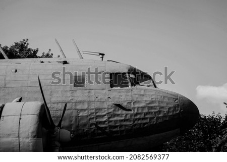 part of an old vintage airplane. black and white picture of the plane
