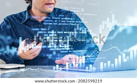 Office man working with gadgets in office room, hud with stock market dynamics, bar chart, double exposure with glowing script. Concept of financial app and trader