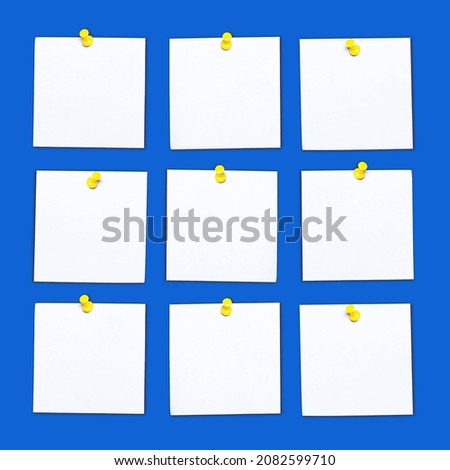 Sticky notes background. Reminder cards pinned to blue wall. Office message texture. Empty copy space blank paper. Memo cards background.