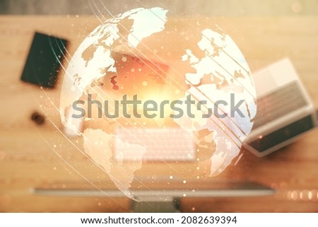 Multi exposure of abstract creative digital world map on laptop background, research and analytics concept