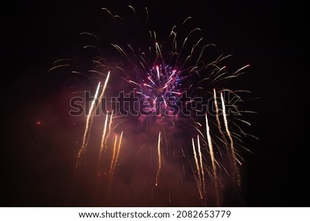 Magic abstract holiday background of sparkling fireworks. Christmas and New Year concept.