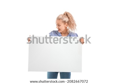 Beautiful young woman with blank poster on white background