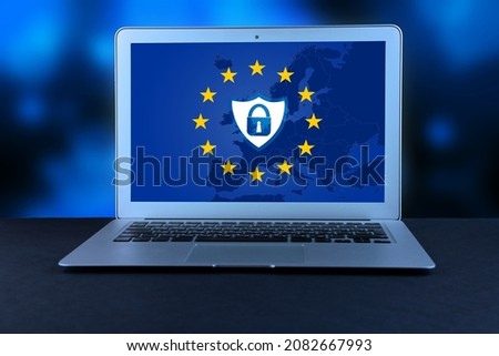 Lock icon and shield icon on the background of the EU flag, on the laptop screen. GDPR, General Data Protection Regulation, European Data Privacy Act. Copy space. High quality photo Royalty-Free Stock Photo #2082667993