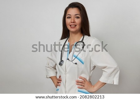 Portrait of woman doctor with stethoscope. Female doctor medical coat on white background with copy space