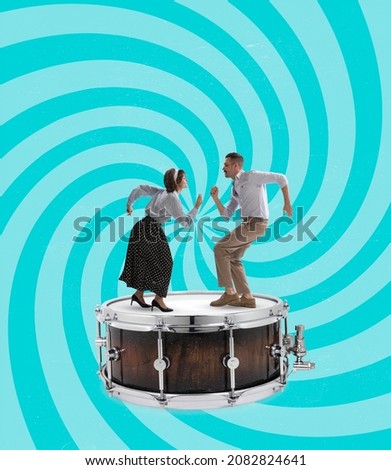 Retro music, vintage style. Contemporary art collage of dancing man and woman on drum isolated over blue hypnotic background. Concept of art, music, fashion, party, creativity and ad