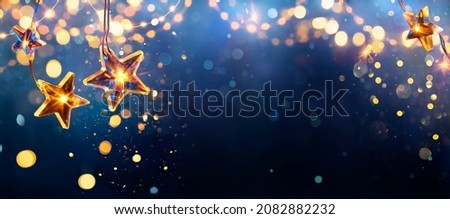 Christmas Stars Lights With Abstract Defocused Elements Royalty-Free Stock Photo #2082882232