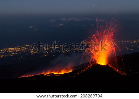 Etna eruption of July 2014 - lava flow and explosions Royalty-Free Stock Photo #208289704