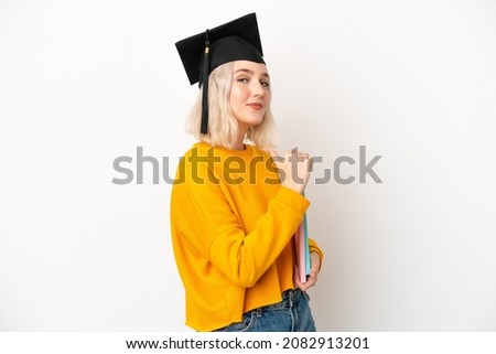 Young university caucasian woman graduate isolated on white background proud and self-satisfied
