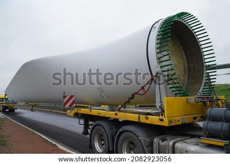 Transport of parts of a wind wheel with an extremely overlong heavy transport truck on the German A2 freeway, Hannover district, Germany, Europe Royalty-Free Stock Photo #2082923056
