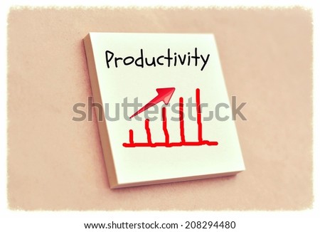 Text productivity goes up on the graph on the short note texture background