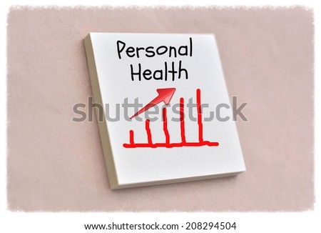 Text personal health goes up on the graph on the short note texture background