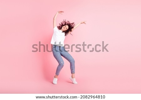 Full size photo of young cheerful excited woman wear casual outfit playful isolated over pink color background