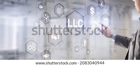 Limited Liability Company concept. Businessman touched LLC Royalty-Free Stock Photo #2083040944