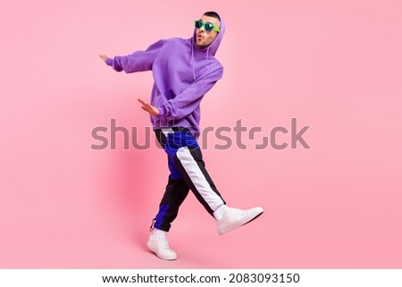 Full size photo of crazy millennial brunet guy dance wear eyewear hoodie pants shoes isolated on pink background Royalty-Free Stock Photo #2083093150