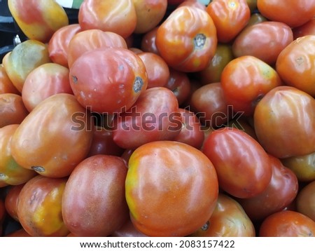 Macro Photo Group of Product fresh Red Tomatoes Vegetables. Stock Photo Food Vegetable Tomato Background in Market. Tomatoes Concept