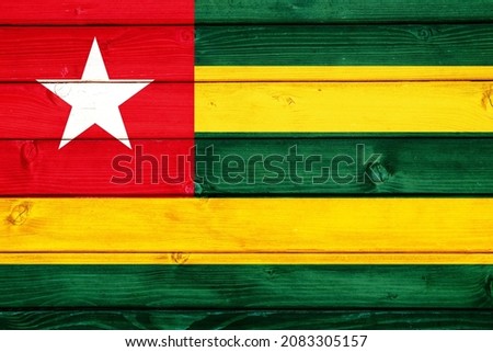 Flag of Togo on wooden surface