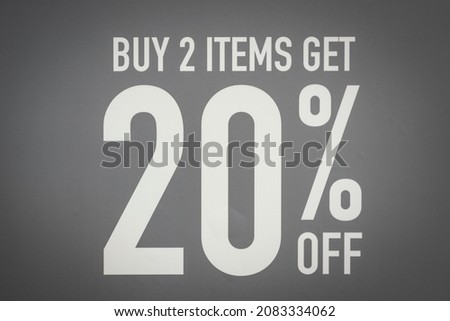 "Buy 2 items get 20% off" special dicsount promotion banner. Business promotion - sign and symbol photo.