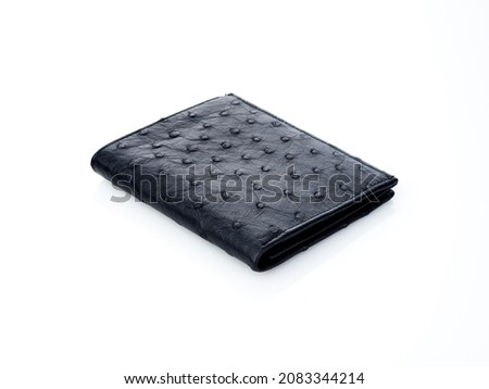 wallet on a white leather background