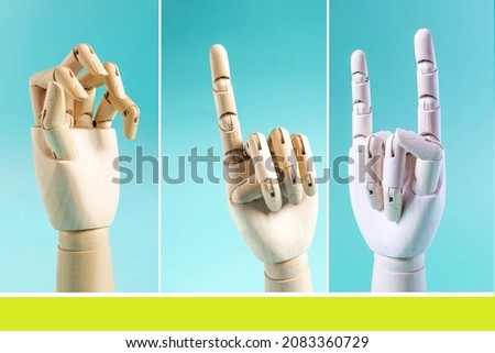 Collage of wooden hands with different gestures close-up. Conceptual hand gesture