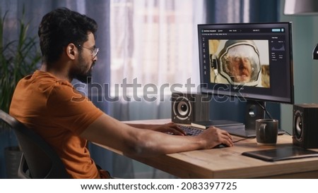 Indian retoucher working with astronaut photo